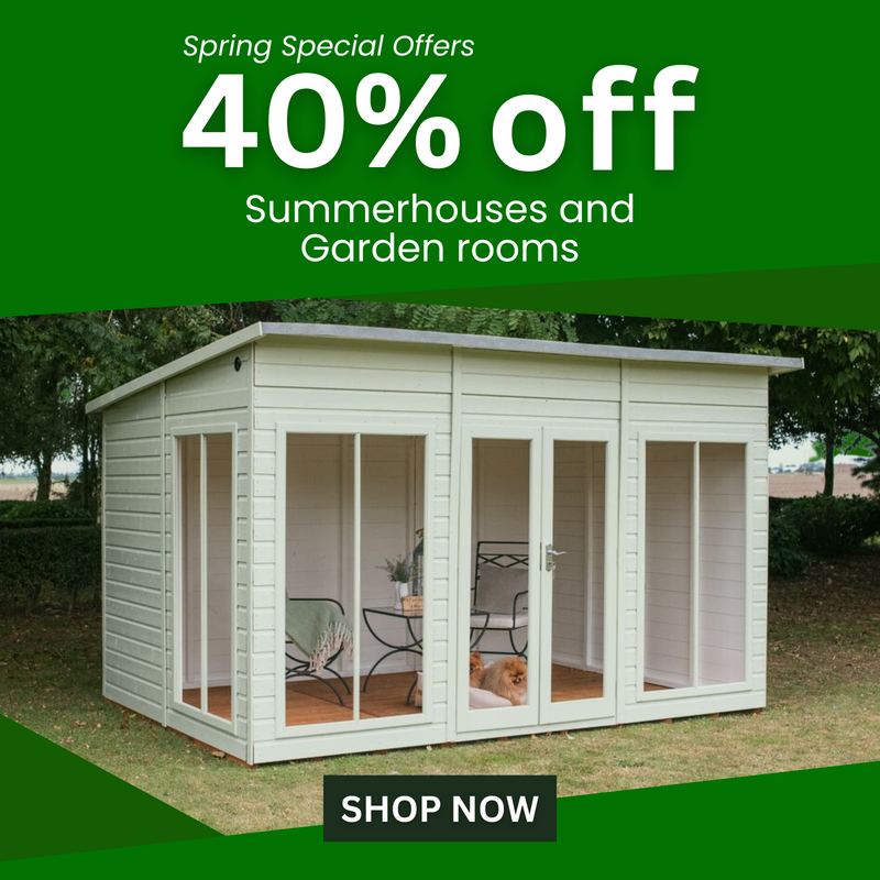 Summerhouse painted in light colours in garden